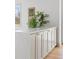 Kitchen island with a white countertop and wooden cabinets at 3930 S Spruce St, Denver, CO 80237