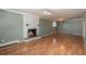 Spacious basement with wood flooring and a fireplace at 900 Emerald St, Broomfield, CO 80020