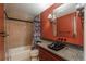 Bathroom with granite countertop and updated fixtures at 900 Emerald St, Broomfield, CO 80020