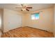 Bedroom with hardwood floors and a window at 900 Emerald St, Broomfield, CO 80020