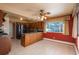 Open kitchen with island and breakfast nook at 900 Emerald St, Broomfield, CO 80020