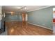 Spacious living room featuring hardwood floors and a fireplace at 900 Emerald St, Broomfield, CO 80020