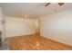 Bright living room featuring hardwood floors and a fireplace at 900 Emerald St, Broomfield, CO 80020