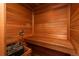 Relaxing wooden sauna with bench and rock heater at 900 Emerald St, Broomfield, CO 80020