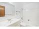 Clean bathroom features a white vanity, neutral walls, and a shower-tub combination at 10150 E Virginia Ave # 7-302, Denver, CO 80247
