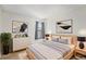 Serene bedroom featuring modern decor, ambient lighting, and a calming color palette at 10150 E Virginia Ave # 7-302, Denver, CO 80247