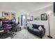 Comfortable bedroom with neutral carpet, artwork, and ample space for relaxing at 10150 E Virginia Ave # 7-302, Denver, CO 80247