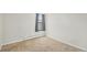Comfortable bedroom features a window with privacy blinds and neutral finishes at 10150 E Virginia Ave # 7-302, Denver, CO 80247