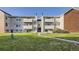 Attractive multi-unit building featuring well-maintained landscaping and a welcoming entrance at 10150 E Virginia Ave # 7-302, Denver, CO 80247