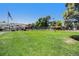 Beautiful green space with a volleyball court, picnic tables, and playground area at 10150 E Virginia Ave # 7-302, Denver, CO 80247