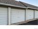 Row of garages offering convenient and secure parking for residents at 10150 E Virginia Ave # 7-302, Denver, CO 80247