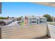 Balcony view overlooking the community with parking and well maintained landscaping at 10150 E Virginia Ave # 7-302, Denver, CO 80247
