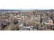 Aerial view of a residential neighborhood showcasing homes and cityscape at 1442 S Logan St, Denver, CO 80210
