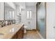 Bathroom with granite countertop and walk-in shower at 1442 S Logan St, Denver, CO 80210