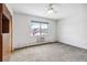 Bright bedroom with carpet and window at 1442 S Logan St, Denver, CO 80210