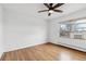 Spacious bedroom with hardwood floors and window at 1442 S Logan St, Denver, CO 80210