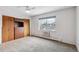Spacious bedroom with carpet and large closet at 1442 S Logan St, Denver, CO 80210