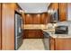 Modern kitchen with granite countertops and stainless steel appliances at 1442 S Logan St, Denver, CO 80210
