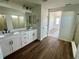 Modern bathroom with double sink vanity at 25323 E Warren Pl, Aurora, CO 80018