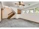 Finished basement with stairs leading up and natural light at 5713 Whitechapel St, Castle Rock, CO 80104