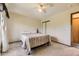 Bedroom featuring neutral walls, ceiling fan, and closet space at 5713 Whitechapel St, Castle Rock, CO 80104