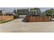Home exterior with long driveway, garage, and mature trees at 5713 Whitechapel St, Castle Rock, CO 80104