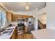 Functional kitchen featuring stainless steel appliances, oak cabinets, and laminate countertops at 5713 Whitechapel St, Castle Rock, CO 80104