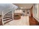 Unique basement with a spiral staircase and a putting green, perfect for recreation and entertainment at 5745 W Mansfield Ave # 265, Denver, CO 80235