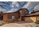 Charming two-story home with a brick and wood exterior, a well-manicured lawn, and a spacious driveway, offering classic curb appeal at 5745 W Mansfield Ave # 265, Denver, CO 80235