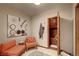 Cozy home sauna room with seating, decor, and easy access from adjacent sitting area at 5745 W Mansfield Ave # 265, Denver, CO 80235