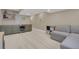 Cozy basement boasts a stylish bar area, perfect for entertaining guests and enjoying leisure time at 18085 E 107Th Pl, Commerce City, CO 80022