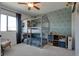 Fun bedroom with bunk beds and a play area at 18085 E 107Th Pl, Commerce City, CO 80022