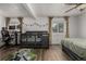 Comfortable bedroom featuring a crib and lots of natural light at 5532 Umatilla St, Denver, CO 80221