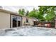 Inviting hot tub with a patio area, perfect for relaxation and entertainment at 5532 Umatilla St, Denver, CO 80221