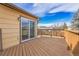 Deck with sliding glass door access from house; backyard view at 9359 W Lake Dr, Littleton, CO 80123