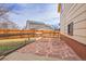 Flagstone patio area next to the house and fenced yard at 9359 W Lake Dr, Littleton, CO 80123