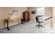 Bright home office features a desk, chair, and built-in storage at 2834 S Fig St, Lakewood, CO 80228