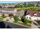 Aerial view of the house in a neighborhood with the green field nearby at 6988 S Riverwood Way, Aurora, CO 80016
