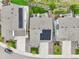 Aerial view showcasing the property's roof, solar panels, backyard, and landscaping at 1607 Goldfield Trl, Castle Rock, CO 80109