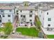 Aerial view of the backyard featuring a deck, patio, and well-maintained lawn, perfect for outdoor activities at 1607 Goldfield Trl, Castle Rock, CO 80109