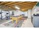 Unfinished basement with exercise equipment, pool table, workout area and carpeted area at 1607 Goldfield Trl, Castle Rock, CO 80109