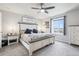Cozy bedroom with a large window, comfortable bedding, and stylish nightstands at 1607 Goldfield Trl, Castle Rock, CO 80109