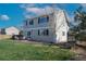 Back exterior showing a patio and nice yard space at 957 Rosedale St, Castle Rock, CO 80104
