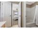 En-suite bathroom with a tub/shower combination provides convenience and privacy at 957 Rosedale St, Castle Rock, CO 80104