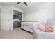 Bright Bedroom with large closet, crib, glider and modern decor at 957 Rosedale St, Castle Rock, CO 80104