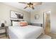 Bedroom featuring a modern bed, minimalist decor, and a view of the en-suite bathroom at 957 Rosedale St, Castle Rock, CO 80104