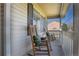 Inviting front porch with two rocking chairs, perfect for relaxing and enjoying the neighborhood at 957 Rosedale St, Castle Rock, CO 80104