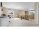 Bright loft area featuring a window and a railing overlooking the living area at 957 Rosedale St, Castle Rock, CO 80104