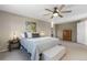 Spacious primary bedroom with a ceiling fan and neutral décor at 957 Rosedale St, Castle Rock, CO 80104