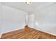 Bedroom featuring hardwood flooring and open layout at 2100 N Franklin St # 15, Denver, CO 80205